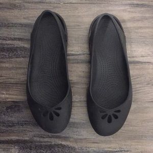 Black CROCS flats